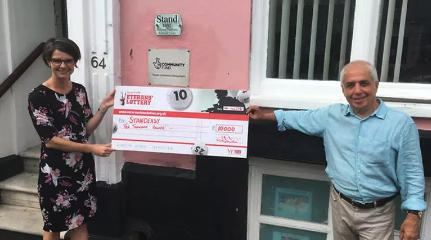 Charity-receives-10000 Charity-receives-10000